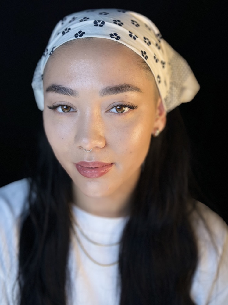 Client with lashes and a patterned white bandana